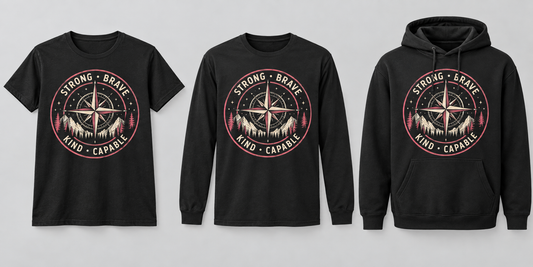 Strong Brave Kind Capable pink and cream compass badge on black T-shirt, long sleeve and hoodie
