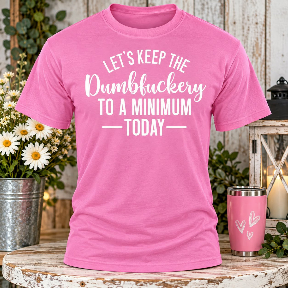 Dumbfuckery Pink T-shirt with themed background